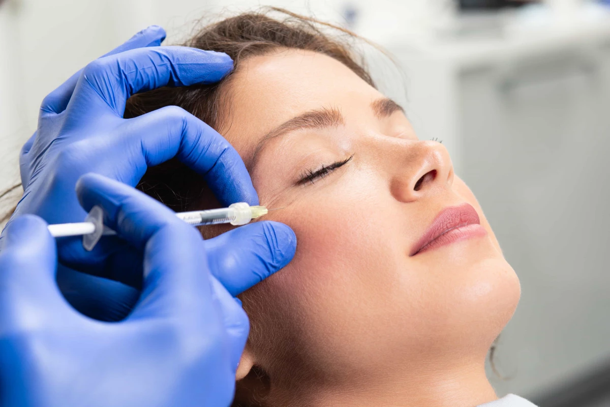 Women receiving facial volume restoration treatment in Pacifica, CA to enhance facial contours