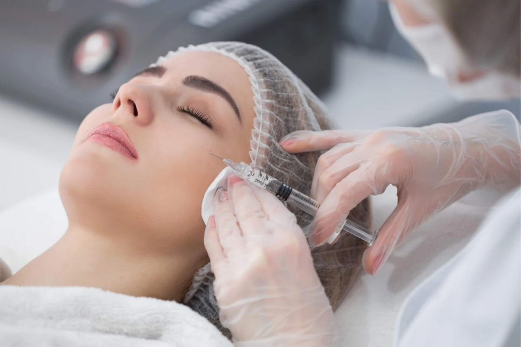 Women receiving Sculptra in Tulsa OK to restore facial volume, soften marionette lines, and enhance natural facial contours.